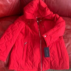 This is a brand new red Tommy Hilfiger winter coat for women